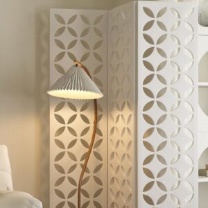 Modern decorative room divider with circular cutout patterns for stylish privacy screens and interior decoration.