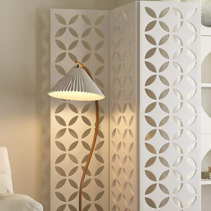 Modern decorative room divider with circular cutout patterns for stylish privacy screens and interior decoration.